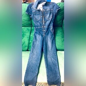 Jean jumpsuit. Never worn. Brand new. Very trendy !